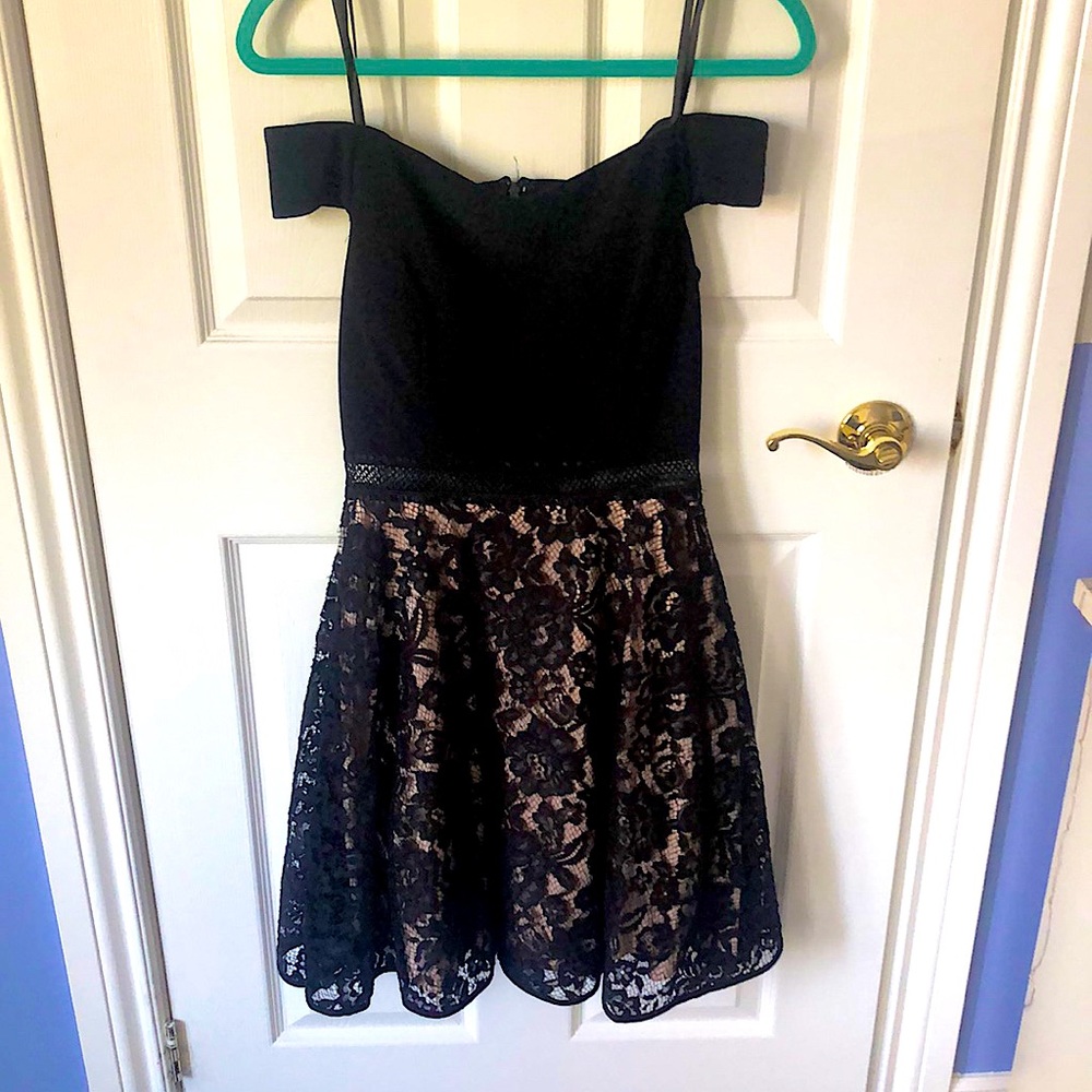 An off the shoulder dress